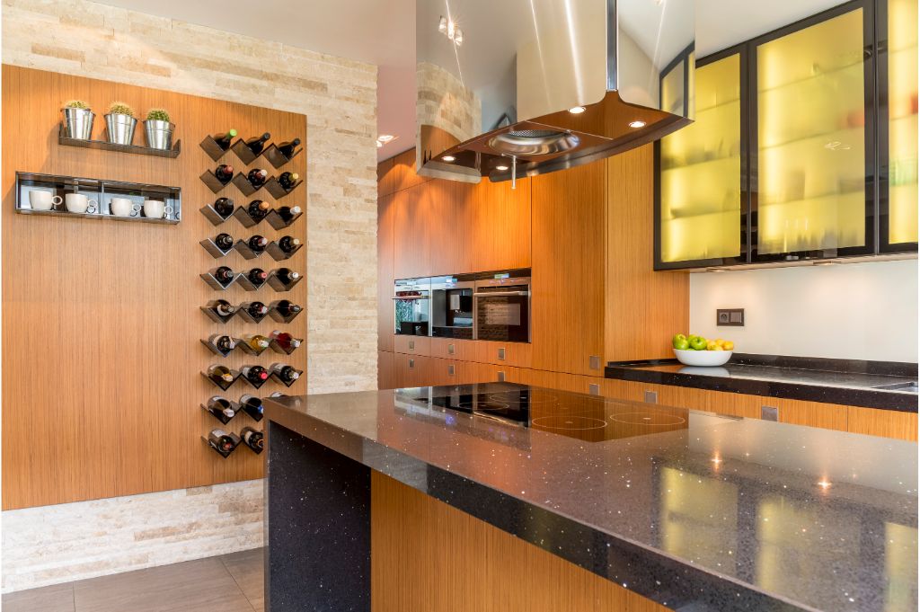 Kitchen remodel contractors reviewing cabinet layouts in Allen TX