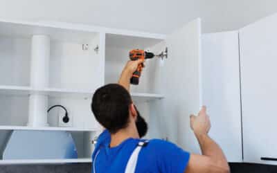 bearded man assembling modern white kitchen cabine 2026 03 17 07 23 22 utc How Long to Install Kitchen Cabinets?